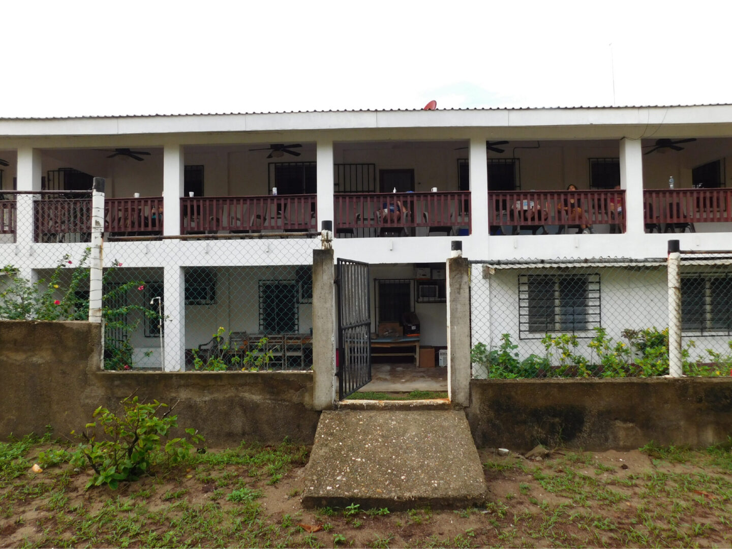 A two-story building (Limón Clinic)