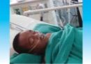 a little boy in the bed with nasal cannula